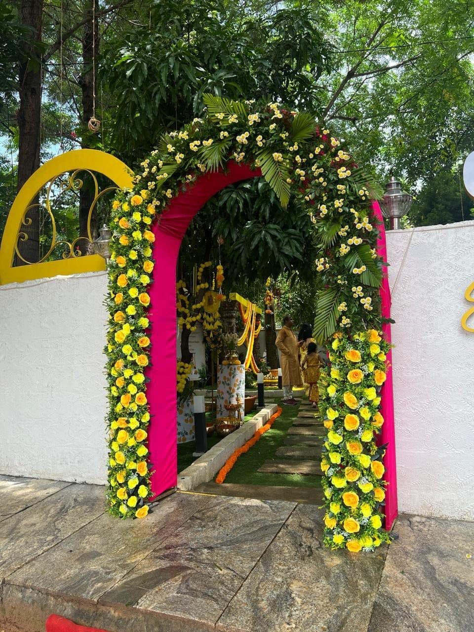 Floral welcome arch at Earthen Courtyard