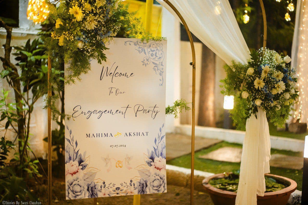 Welcome signage with floral styling