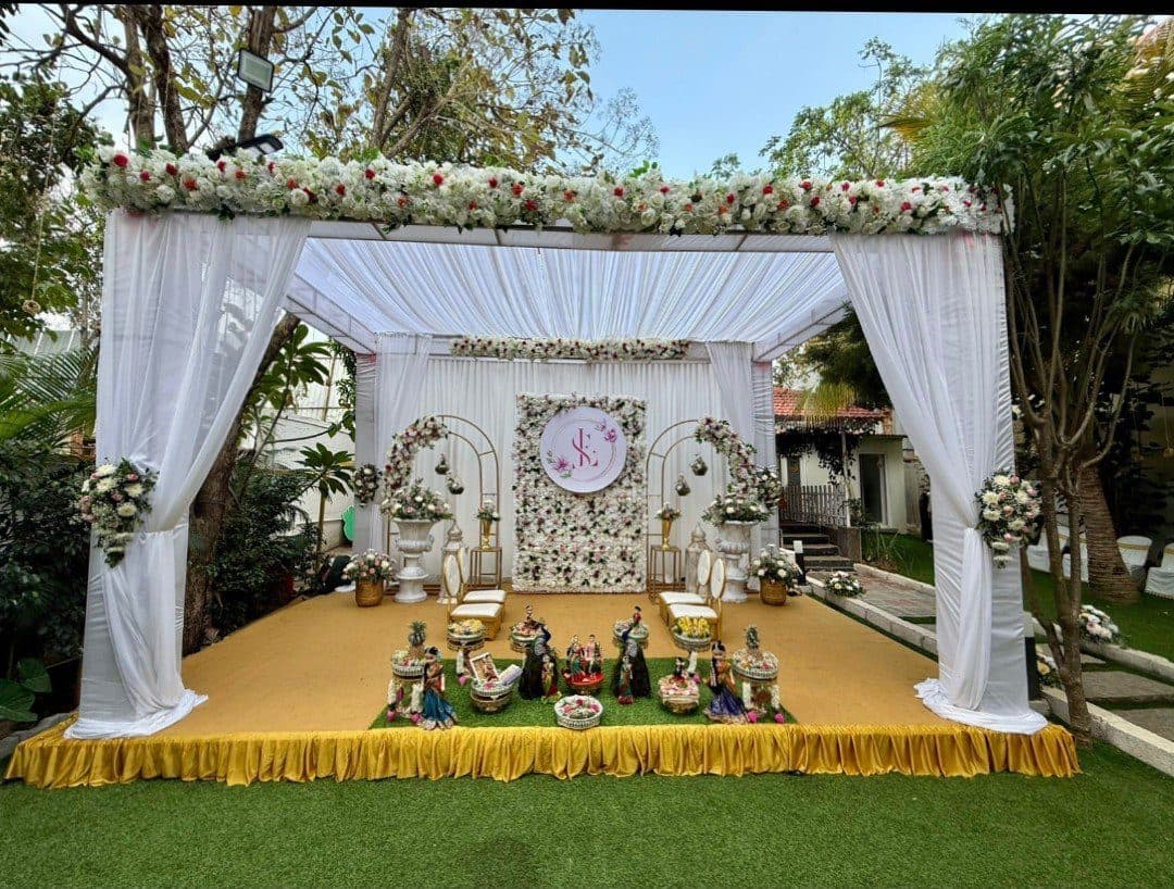White and gold traditional mandap-style decor